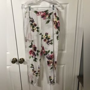 Women’s Tempo Paris Large linen pants. Floral print on white background.